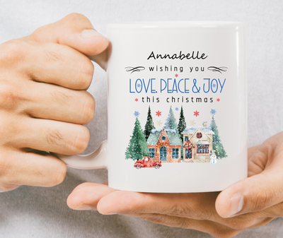 A snowing Christmas scenery with two buildings, pine trees, snowman and a red truck.