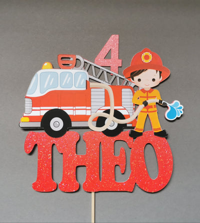 Children's birthday party decoration with firefighter theme on a gray background