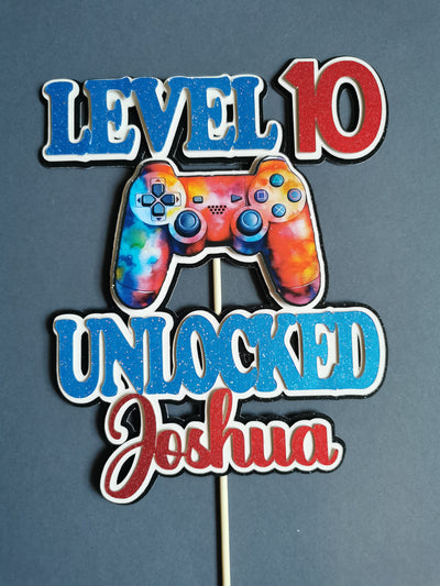 Colorful gaming controller with 'Level 10 Unlocked Joshua' text on a gray background