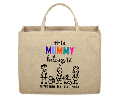 Beige tote bag with colorful text and family illustrations on a white background