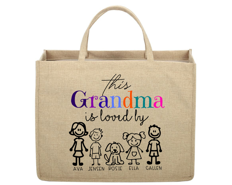 Beige tote bag with colorful text and stick figure family design on a white background