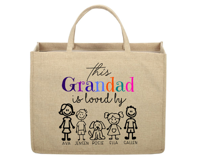 Beige tote bag with colorful text and stick figure family design on a white background