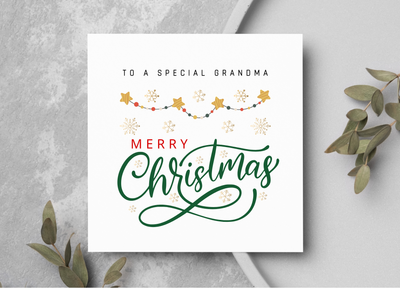 Merry Christmas card showing star and snowflake decorations.