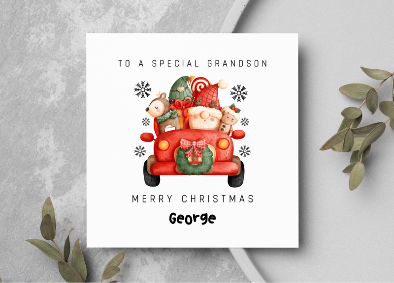 Christmas card for a special grandson with a red truck and Santa Claus illustration on a gray background.