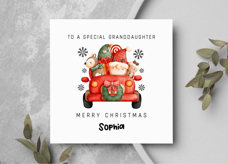 Christmas card with a red truck and Santa Claus, personalized for a special granddaughter.