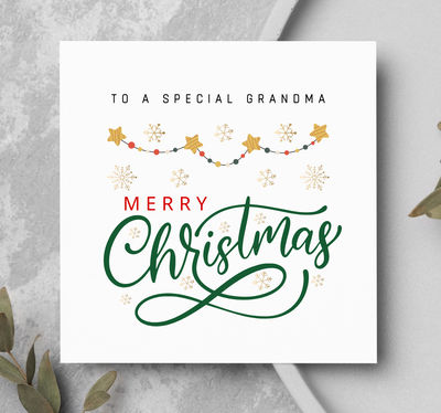 Merry Christmas card showing star and snowflake decorations.