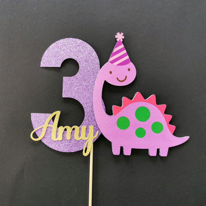 Purple dinosaur cake topper